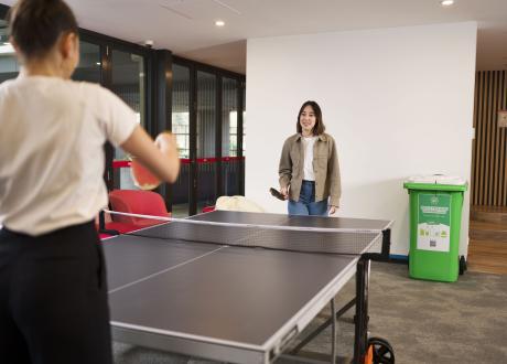 Officeworkers playing table tennis